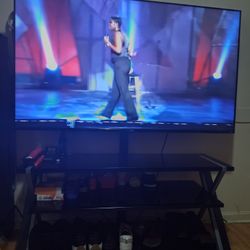 65 Inch With Glass Stand Like New