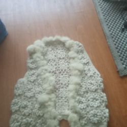 Knitted Women's Vest with Fur Trim.