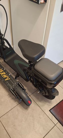 Electric sit down scooter with 2nd seat