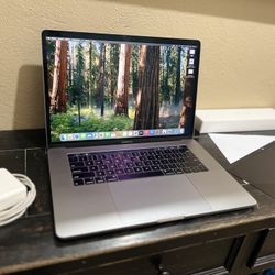 MacBook Pro 15-inch “Core i7 Touch Bar” macOS Sequoia 15.7.3 250GB Storage Intel UHD Graphics 630 Retina Display (2880 x 1800) 1536MB VRAM 16GB RAM (e