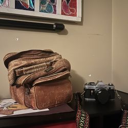 Canon AE-1 vintage film camera (comes with vintage camera bag)