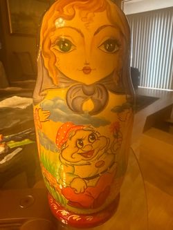 Nesting doll with cartoons
