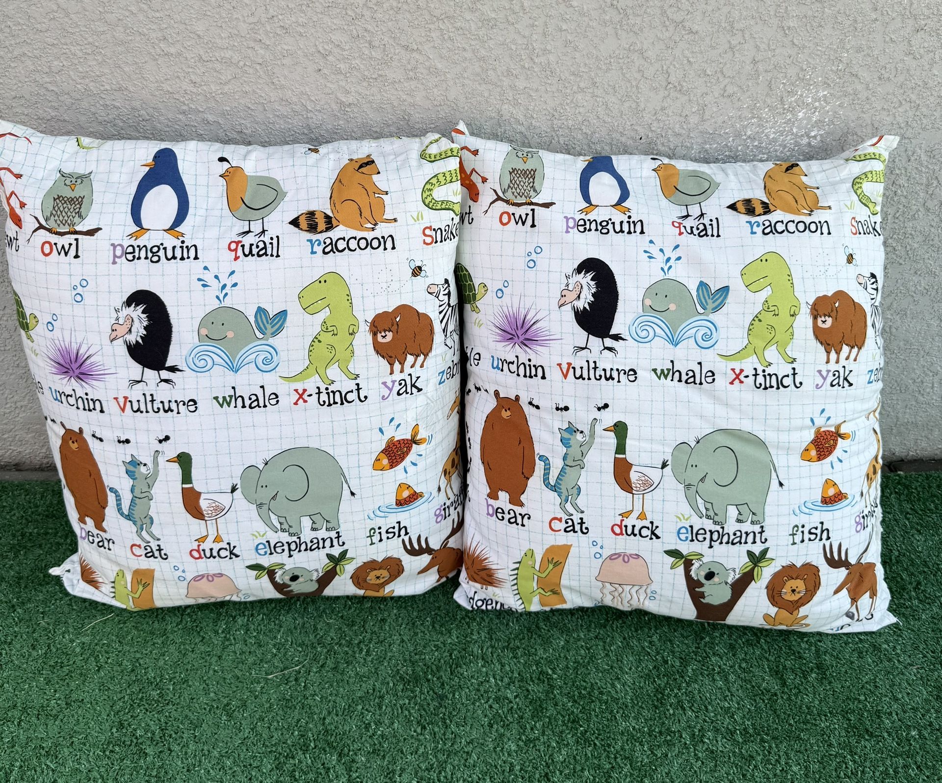 Selling 2 kids animal cushions, 23 x 20 in