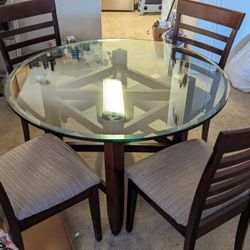Round glass top and wood dinning Set
