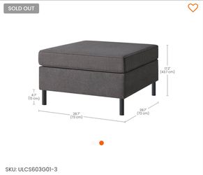 Dark gray cloth ottoman