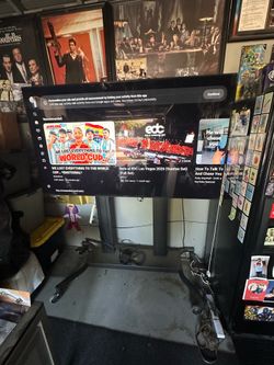 Large Flat Screen TV on Rolling Stand