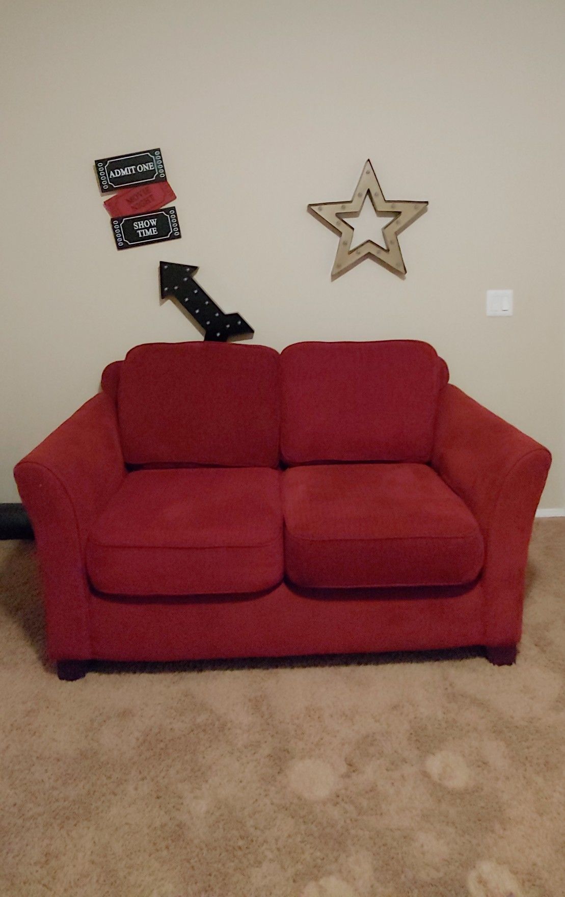Red loveseat, like new.