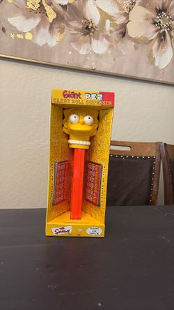 Giant pez candy roll dispenser