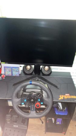 Playstation 5 with monitor and ps5 wheel and pedals