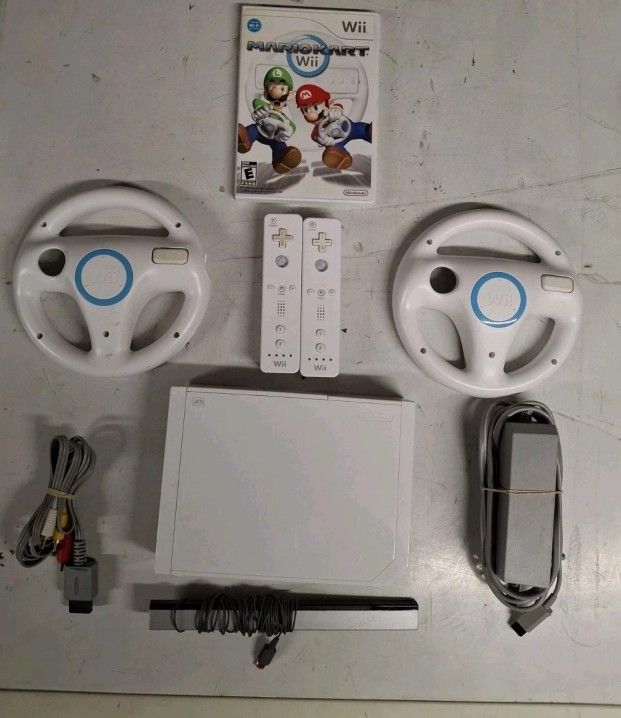 WII complete With Mario Kart And 2 Wheels