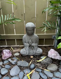 Buddha Garden Statue. Made out of concrete. Weighs about 45 pounds. 21 inches tall. In excellent condition. Purchase for $225.  The back of the statu