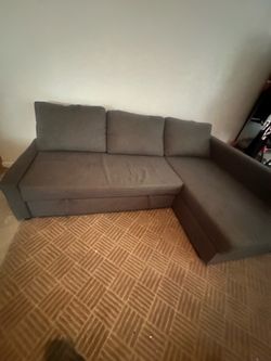 Couch sectional with pull out