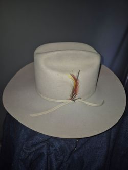 Stetson tan felt cowboy hat,$125.00