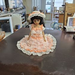 Beautiful Doll In Peach & White Lace Dress With Faux Pearl Necklace, Attached To A Straw Hat