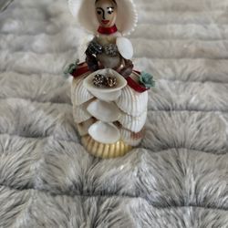 small seashell folk art doll