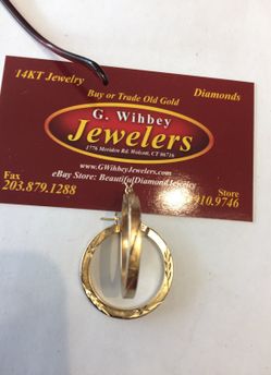 14 Kt real Gold hoops 1 1/4”