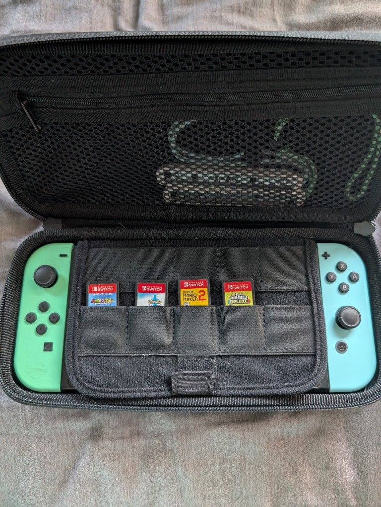 Nintendo Switch Animal Crossing console with 7 games