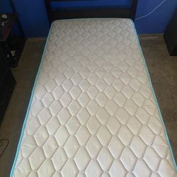 Twin Bed And Wood Frame 