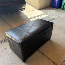 Black storage ottoman