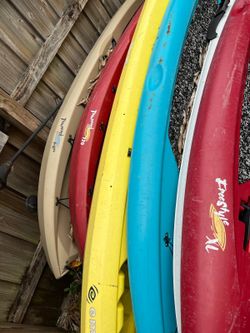 Kayaks paddle boards water trampoline