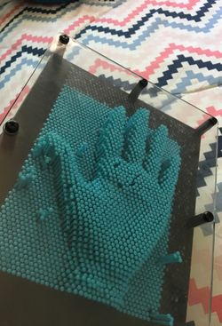 Blue hand toy