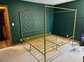 Newly used queen size gold canopy bed frame