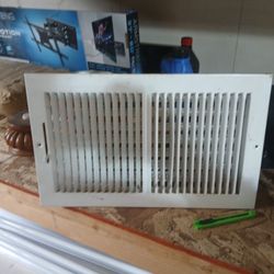 White metal vent cover