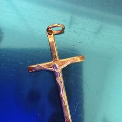 Vendo hermosa cruz de oro blanco y amarillos de 14k