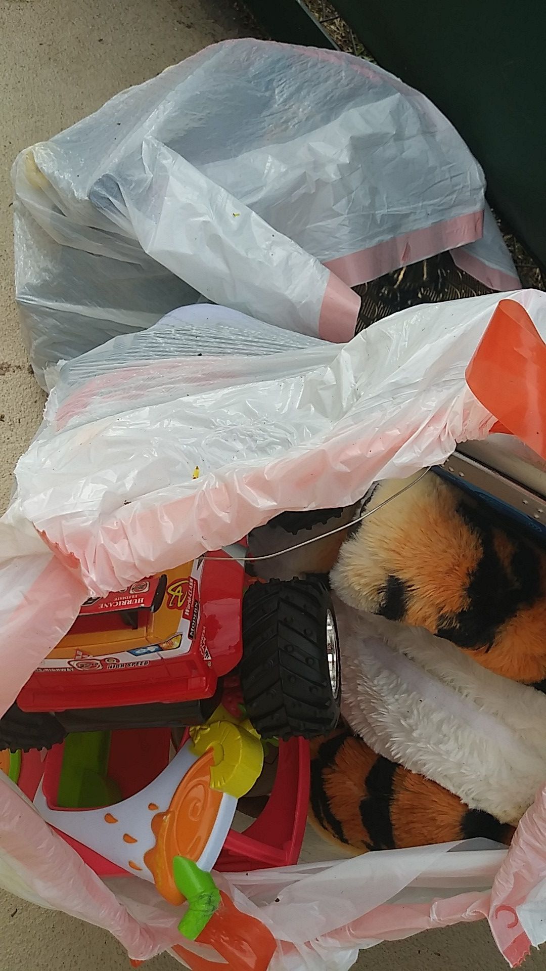 2 bags of toys and like new childrens books 2 bags