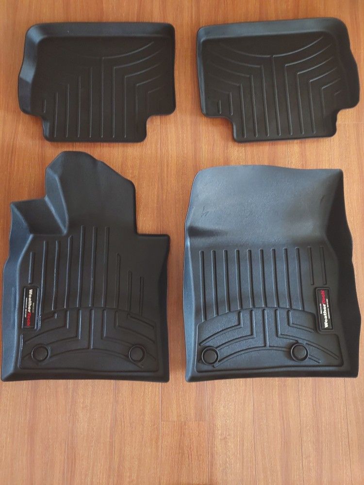 Wather Tech floor Mats for a 2019 Mazda 3, Sedan.