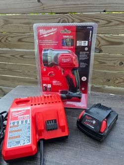 Brand new Milwaukee M18 LED WORK LIGHT, plus used (great condition) M18 redlithium CP2.0 & Charger.