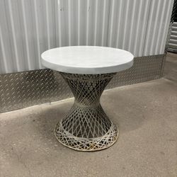 Hard top wicker bottom outdoor side table …20” round , 21” high $40