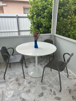 White tulip table and chairs