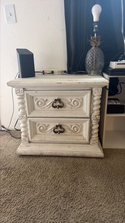 White wooden nightstand with two drawers