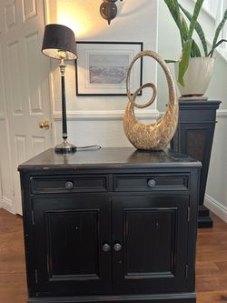 Black Distressed Wood Cabinet with built in plugs for electronics