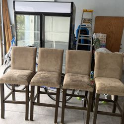 Set of 4 bar stools. 28 inches in height from the floor to the seat.