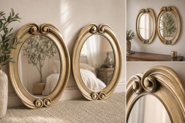 Pair of ornate light gold mirrors