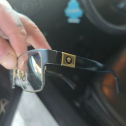 selling Versace glasses Gucci sunglasses and a vintage Gucci watch