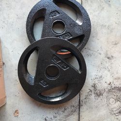 2-25lbs Olympic Style Weights 2inches. BRAND NEW