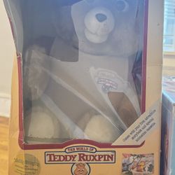 vintage Teddy Ruxpin, the world's first animatronic talking toy, in its original box.  