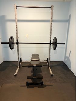 Squat rack, weight plate set and adjustable Marcy bench