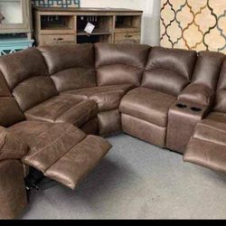 Tambo 2 Piece Reclining Sectional Couch. Financing Options Available 