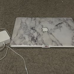 Macbook (With charger)