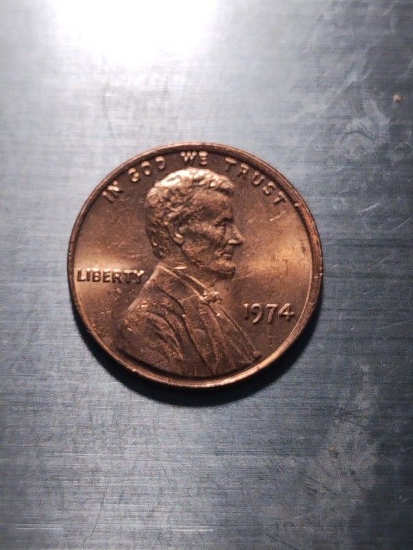 1974 Off Center DDO And Doubling On Back Side.