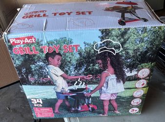 Grill toy set featuring interactive lights and sounds.