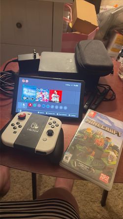 Nintendo Switch OLED Bundle with Minecraft - Hogwarts Legacy- Red Dead- Mario kart deluxe 8