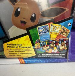Three pack Costco colector pokemon cards