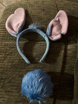 Stitch ears and take