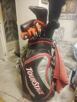 Full set of irons three iron two picture with and a sand wedge driver Bridgestone stiff job seven wood three wood pinewood hybrid utility almost like
