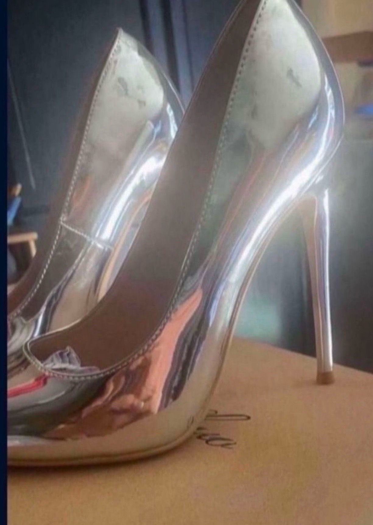 Silver high heels $20 never used size 7.